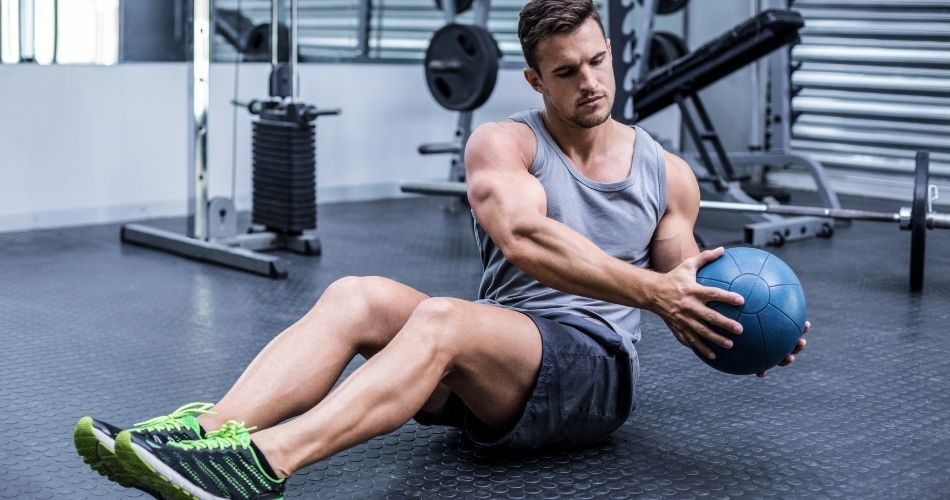 Russian twist exercise to hit the internal and external obliques